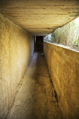 Dark tunnel path straight perspective