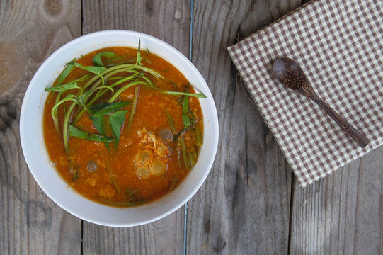 Sour Soup Made Of Tamarind Paste With Fish Roe On The Wooden Tab