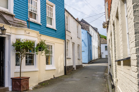Narrow Street Lined with Colourful Buildings in a Fishing Village in Cornwall