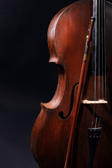 Fototapeta premium Vintage cello on dark background