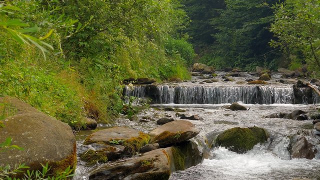 4k,
Waterfall in the mountains near the village Pylypets, Carpathians