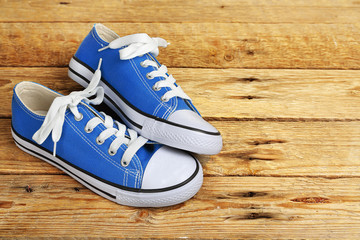 sneakers on wood