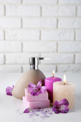 Beautiful composition of spa treatment on white wooden table