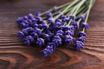 Obraz na płótnie Canvas Fresh lavender on wooden table, closeup