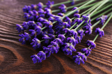 Obraz na płótnie Canvas Fresh lavender on wooden table, closeup
