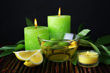 Obraz premium Spa still life in green color on bamboo mat, closeup