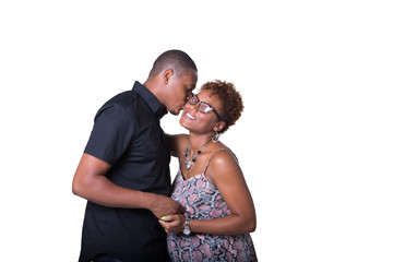  Portrait of an expecting African American couple kissing