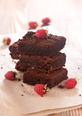 Cake chocolate brownies on  light wooden background