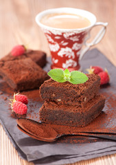 Cake chocolate brownies and cup espresso