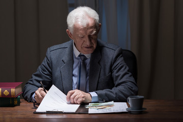 Man filling in legal papers