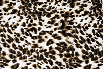  Texture fabric of leopard skin for background © somchaiphanbun