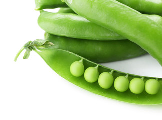 Fresh green peas isolated on white