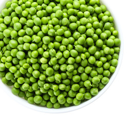Fresh green peas in bowl isolated on white