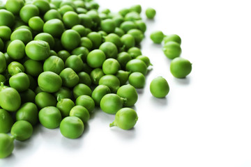 Heap of fresh green peas isolated on white