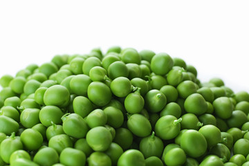 Heap of fresh green peas close up