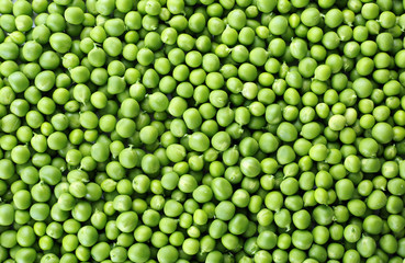 Fototapeta na wymiar Heap of fresh green peas close up