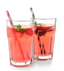 Glasses of strawberry juice  isolated on white