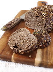 Slices of rye french bread and knife