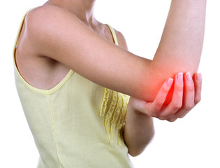 Young woman with elbow pain isolated on white