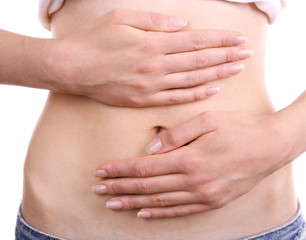 Young girl with abdominal pain close up