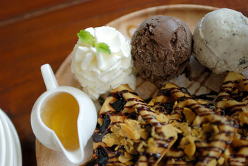 Waffle with chocolate cream and ice cream
