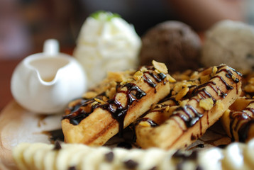 Waffle with chocolate cream and ice cream