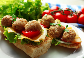Meatball Sandwiches on wooden table background