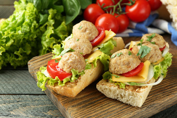 Meatball Sandwiches on wooden table background