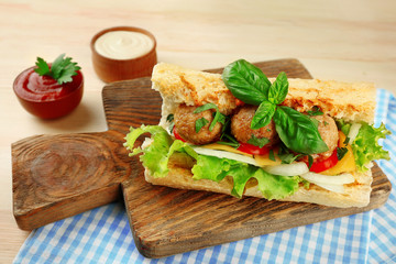 Meatball Sandwich on wooden table background