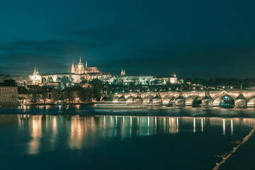 Fototapeta premium Prague Castle and Charles Bridge at night, Czechia