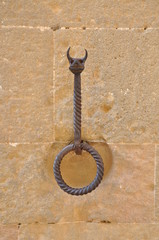 Forged decorative wall bracket knocker