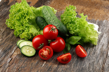 Fresh vegetables on wooden background