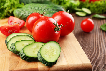 Fresh vegetables on wooden table, closeup