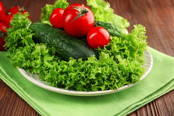 Fresh vegetables on wooden table, closeup