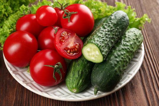 Fresh vegetables on wooden table, closeup