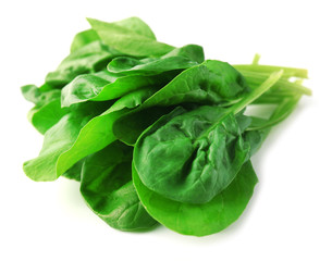 Fresh spinach leaves isolated on white