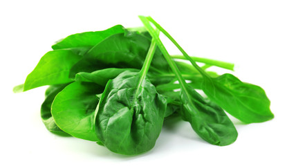 Fresh spinach leaves isolated on white
