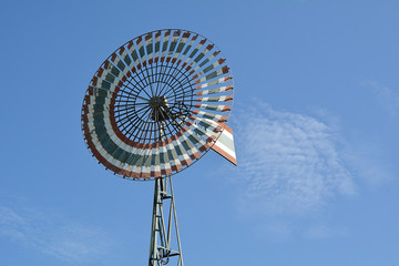 Wind turbine, a turbine having a large vaned wheel rotated by the wind to generate electricity. Wind generator, Wind power unit 