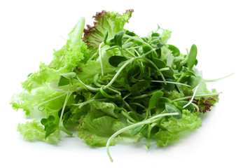 Fresh mixed green salad isolated on white