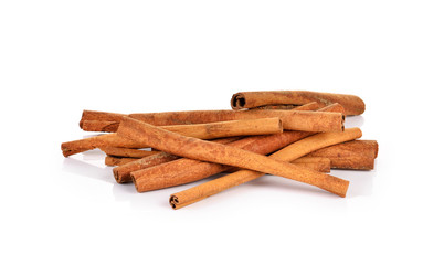 Cinnamon sticks on white background
