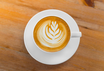 Latte Coffee art on the wooden table