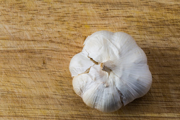 Clove garlic peel on a  board