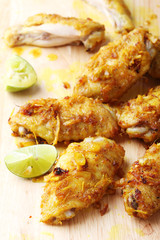 chicken wings roasted with turmeric and herbs