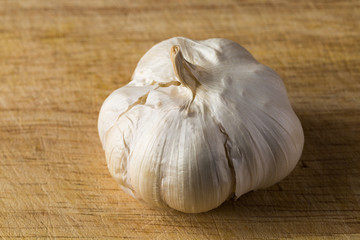 Clove garlic peel on a  board