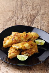 chicken wings roasted with turmeric and herbs