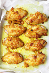chicken wings roasted with turmeric and herbs