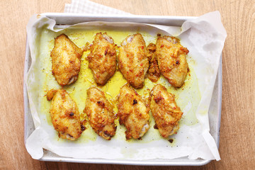 chicken wings roasted with turmeric and herbs