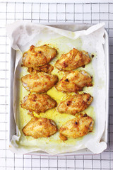chicken wings roasted with turmeric and herb