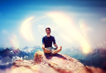 Fototapeta premium Aura surrounding a meditating climber