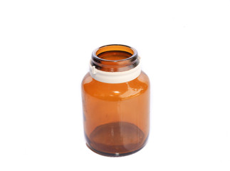 Yellow bottle of medicine isolated on white background.